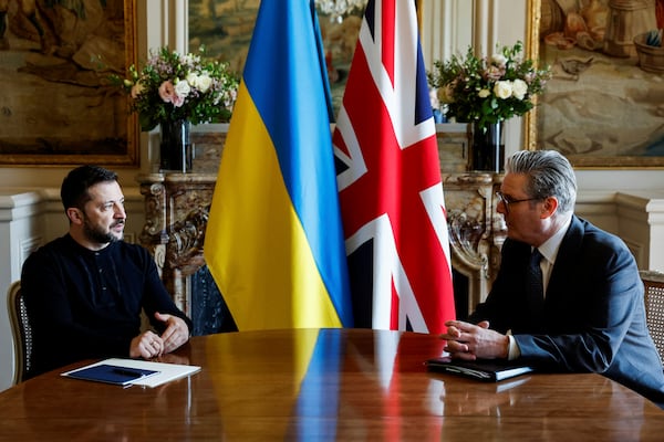 British Prime Minister Keir Starmer, right, and Ukraine's President Volodymyr Zelenskyy meet at the UK Ambassador's Residence after a meeting with European leaders on strengthening support for Ukraine, in Paris, Thursday, March 27, 2025, on the sidelines of a summit for "coalition of the willing". (Stephanie Lecocq/Pool Photo via AP)