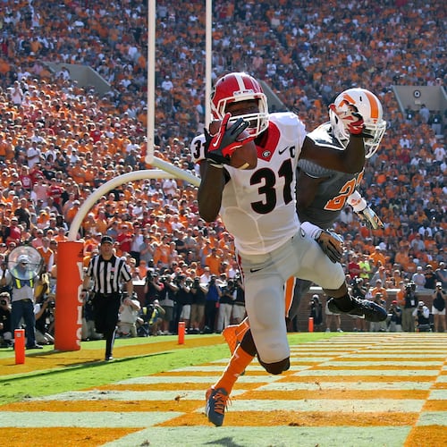 Former Bulldogs wide receiver Chris Conley is well aware of his team’s trials against its crimson nemesis, the struggle that goes back to his own days in red and black. (Jason Getz/AJC 2014)