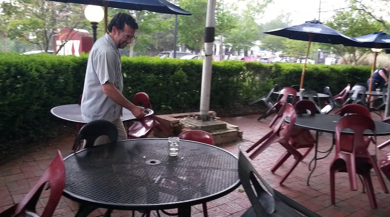 Dean Chronopoulos, the owner of Roxx Tavern, has seen lots of traffic in front of his Cheshire Bridge Road business, as drivers navigate around the collapsed portion of I-85 in Atlanta. But few patrons stop in. MATT KEMPNER / AJC