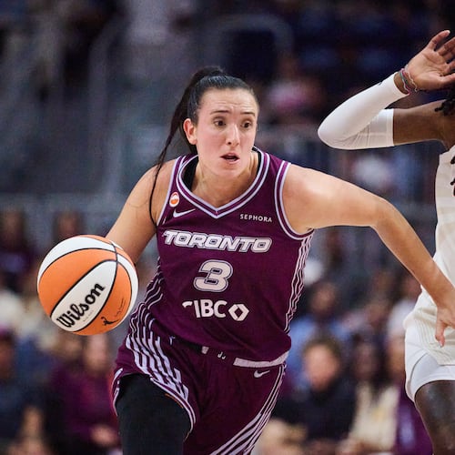 Toronto Tempo's Marina Mabrey (3) drives past Atlanta Dream's Rhyne Howard (10) during first half of a WNBA basketball game in Toronto, Friday, July 17, 2026. (Sammy Kogan/The Canadian Press via AP)