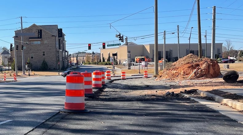Work continues on intersection improvements at Bush Road and Medlock Bridge Road in Peachtree Corners. (Photo by Karen Huppertz for the AJC)