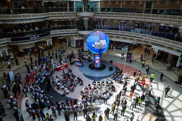 People record during the unveiling of Atlas, a new digital sphere, at the Hartsfield-Jackson Atlanta International Airport in Atlanta on Tuesday, June 2, 2026. (Abbey Cutrer/AJC)