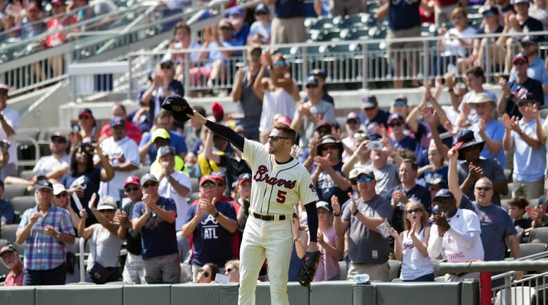 Freddie Freeman waves to the crowd as he leaves Sunday’s game against the Philadelphia Phillies in the second inning.