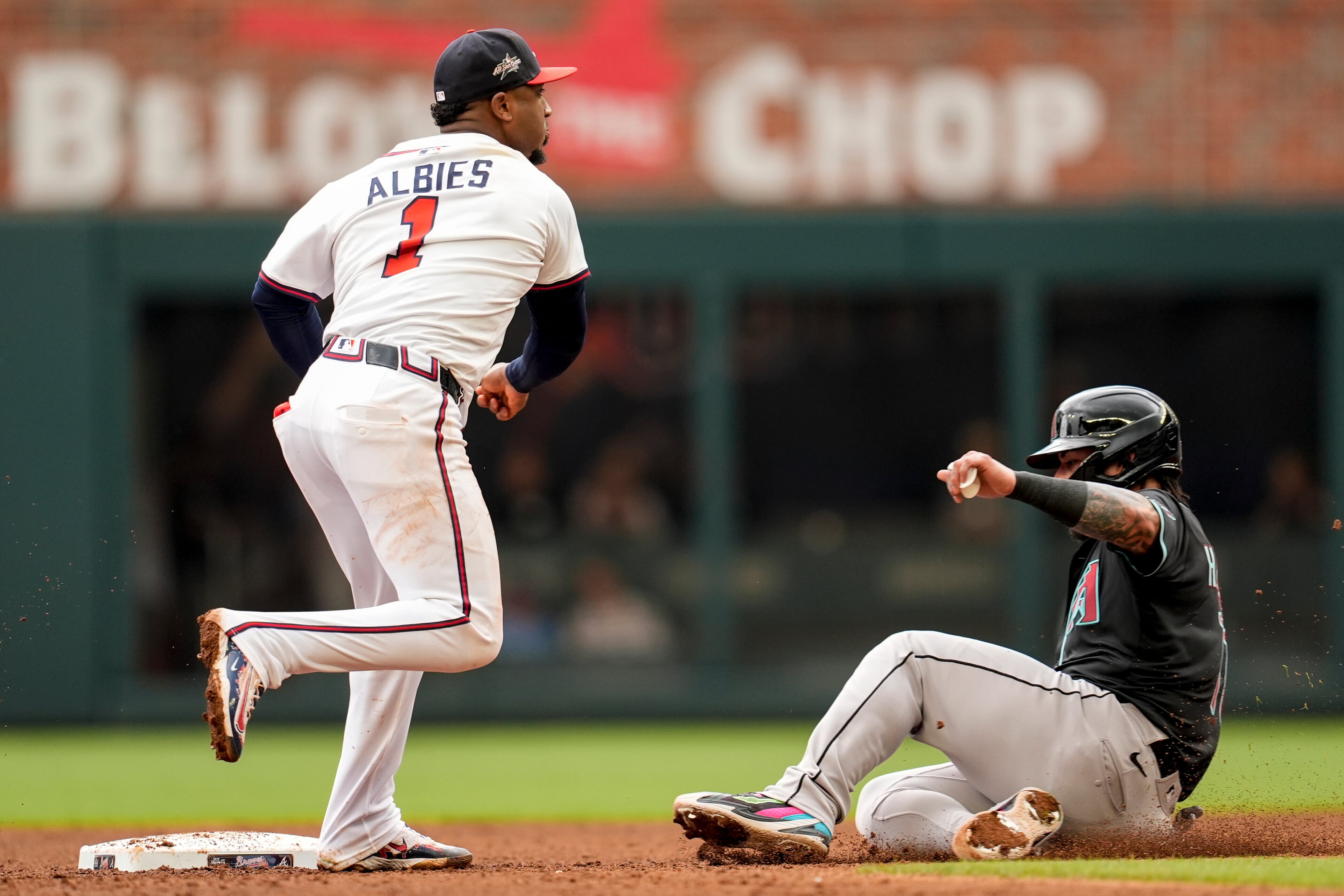 Atlanta Braves second baseman Ozzie Albies makes the tag on Arizona Diamondbacks' Jose Herrera in the fifth inning of a baseball game, Thursday, June 5, 2025, in Atlanta. (Mike Stewart/AP)