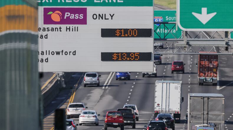 It cost drivers a record $13.95 to drive on the “HOT” express lanes on I-85 southbound in Gwinnett and DeKalb counties on Mon., Aug. 22, 2016. JOHN SPINK / JSPINK@AJC.COM