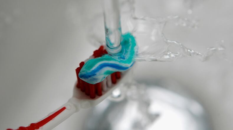 Dental health experts worry that more people are using toothpaste that skips the most important ingredient -- fluoride -- putting them at a greater risk of cavities.