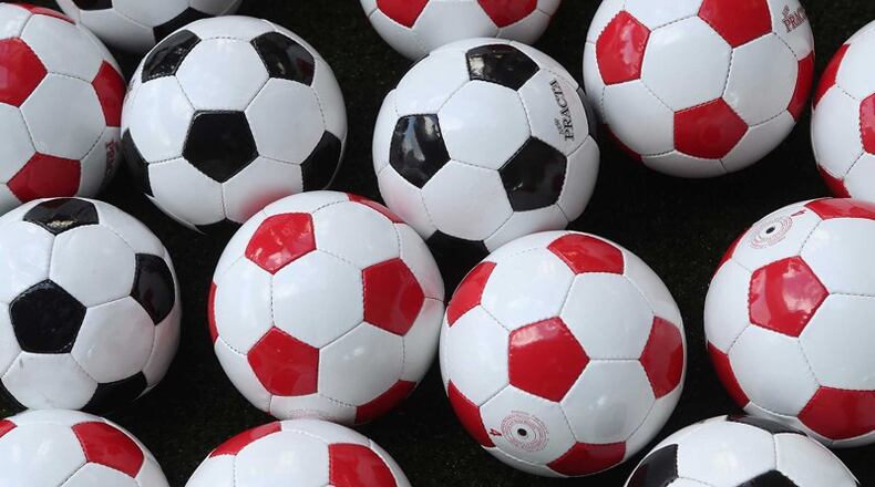 The Cherokee County School Board has approved a partnership agreement with the Cherokee Soccer Association for continued use of the fields at Sixes Elementary School and new use of fields at Arnold Mill Elementary School. AJC FILE
