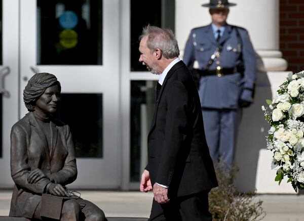 Donnel “Jeff” Carter participates in a wreath laying ceremony outside the Rosalynn Carter Health & Human Services complex at Georgia Southwestern State University, Monday, November 27, 2023, in Americus. (Hyosub Shin / Hyosub.Shin@ajc.com)