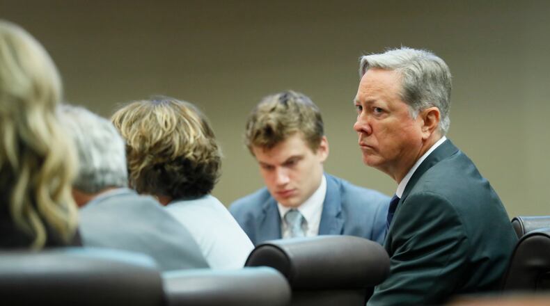 September 23, 2019 - Decatur -  Former DeKalb County Police Officer Robert "Chip" Olsen (right) sits with his attorneys, including Lukas Alfen, as the first jury panel was seated in the court for voire dire.   Jury selection began this morning in his murder trial.  Judge LaTisha Dear Jackson also ruled on motions that were filed in the case on Friday.  Bob Andres / robert.andres@ajc.com