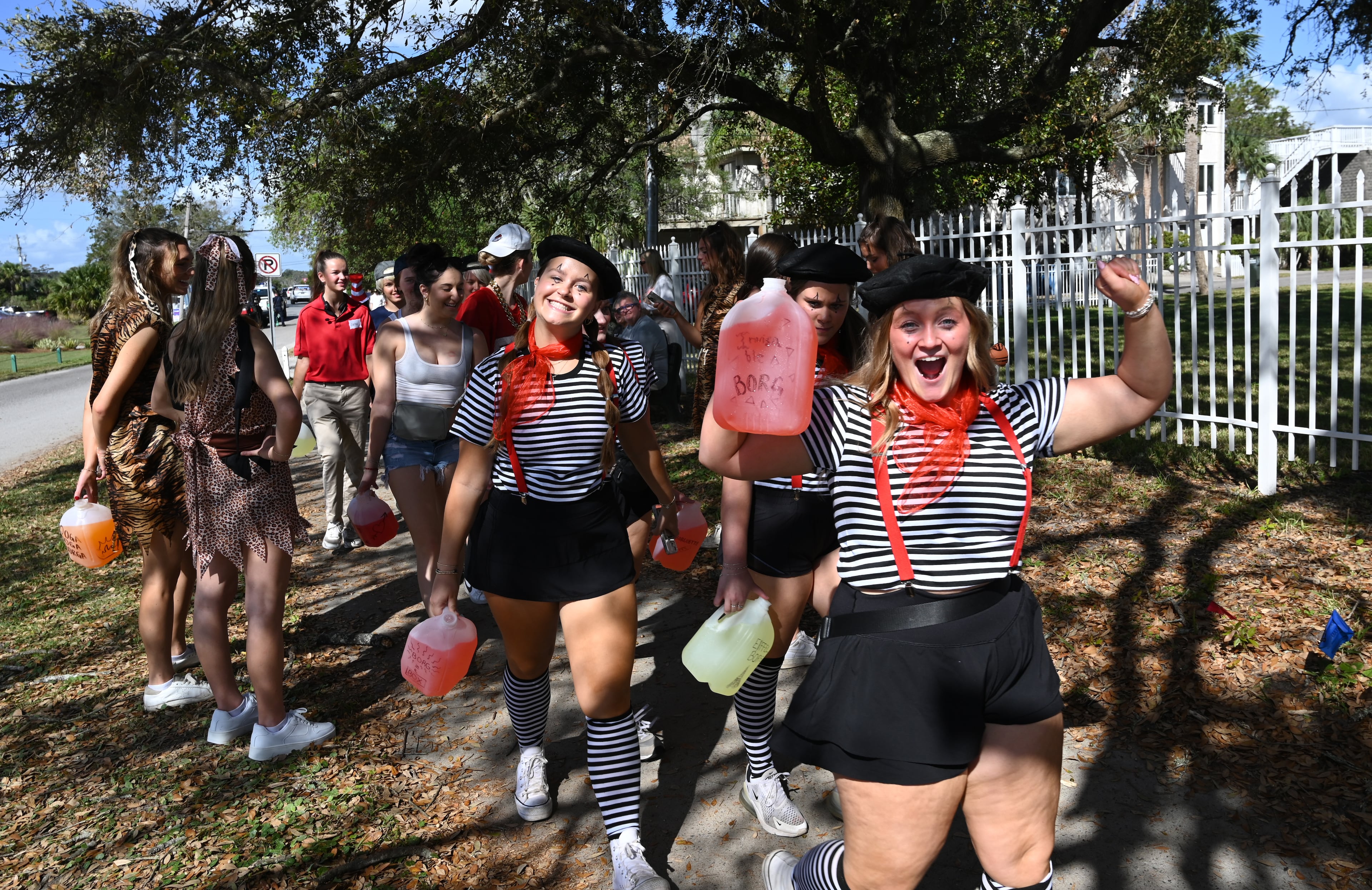 UGA students with Halloween costumes arrive for the annual “Frat Beach” party to celebrate before the annual Georgia-Florida football game on St. Simons Island, Friday, November 1, 2024. On the weekend of the Georgia-Florida football game, St. Simons Island’s East Beach becomes “Frat Beach,” an open-air party teeming with thousands of college students. (Hyosub Shin / AJC)