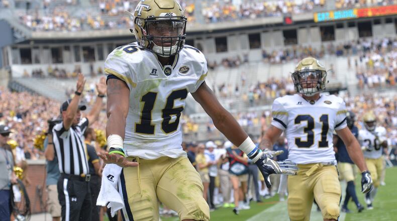 September 23, 2017 Atlanta - Georgia Tech quarterback TaQuon Marshall (16) celebrates after he scored a touchdown in the first half at Bobby Dodd Stadium on Saturday, September 23, 2017. HYOSUB SHIN / HSHIN@AJC.COM