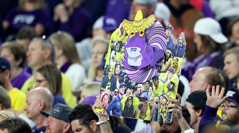 A TCU fan holds up a hypnotoad at the Vrbo Fiesta Bowl at State Farm Stadium on Dec. 31, 2022, in Glendale, Arizona. The hypnotoad now seeks a national championship for the Horned Frogs. (Amanda McCoy/Fort Worth Star-Telegram/TNS)