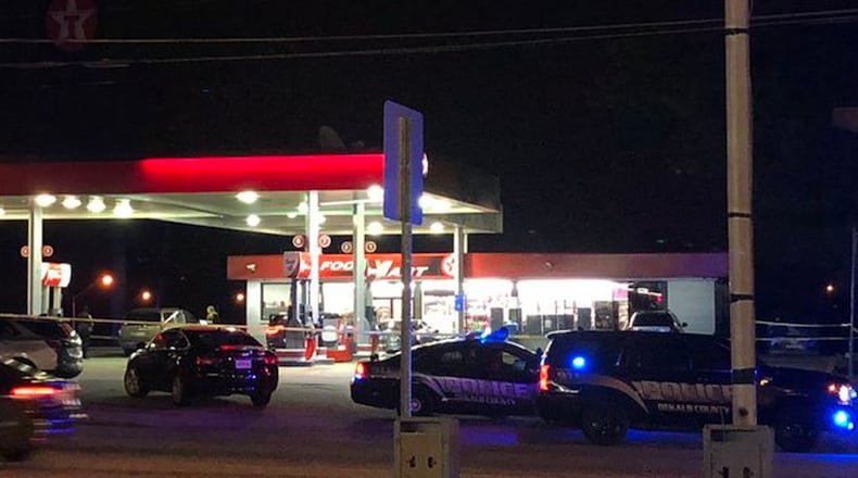 Investigators said two men were involved in a verbal dispute at the gas station, and one of them shot the other.