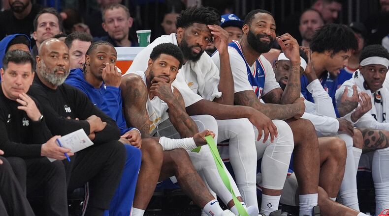 Most of the starting line-up for the Philadelphia 76ers watches from the bench during the second half of Game 1 in a second-round NBA basketball playoffs series against the New York Knicks Monday, May 4, 2026, in New York. (AP Photo/Seth Wenig)