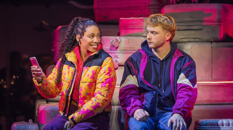 Christiani Pitts (left) and Sam Tutty appear during a performance of "Two Strangers (Carry a Cake Across New York)" in New York on Oct. 31, 2025. (Matthew Murphy/AP)