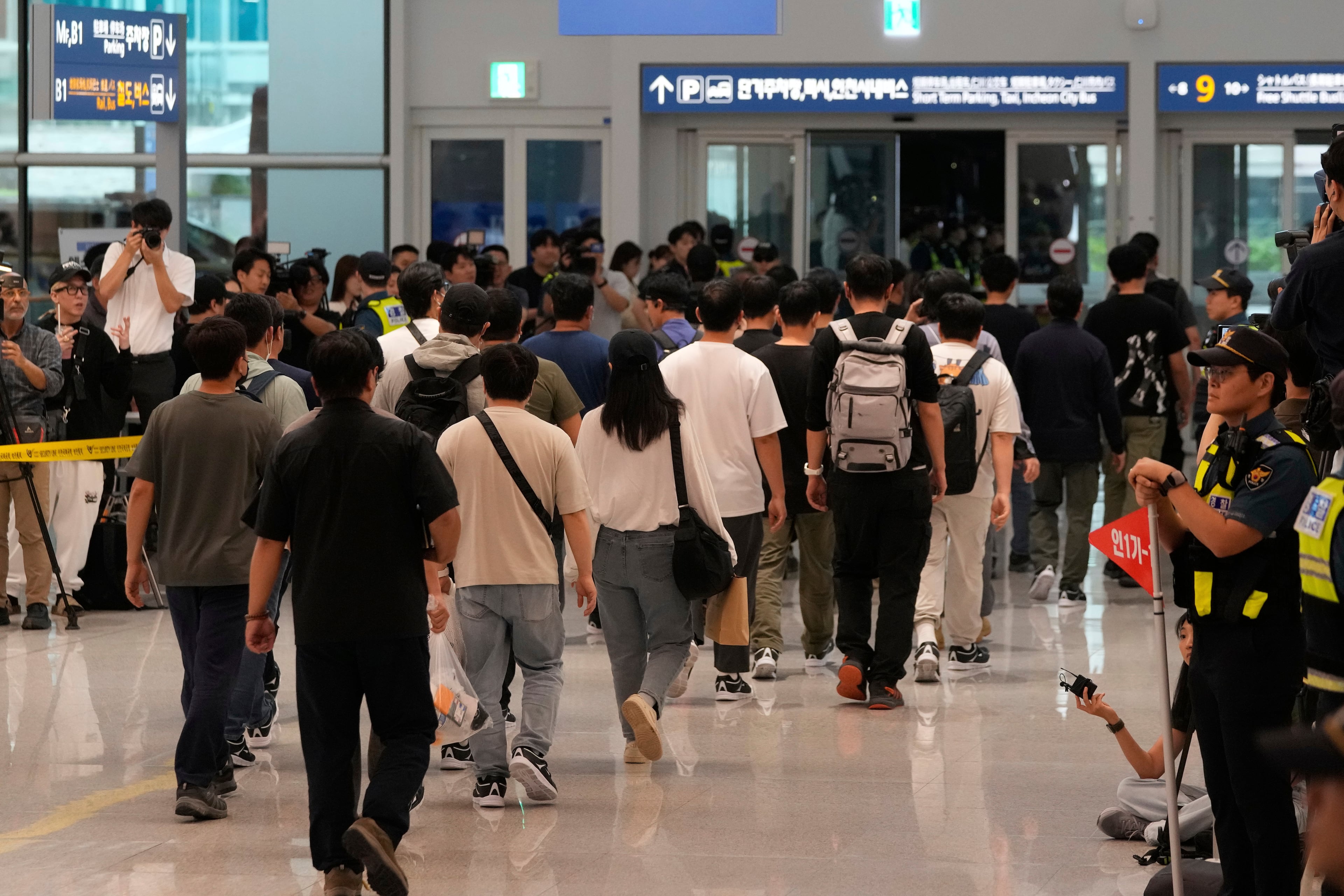 South Korean workers released after days of detention in Georgia arrive at the Incheon International Airport, in Incheon, South Korea, Friday, Sept. 12, 2025. (Ahn Young-joon/AP)