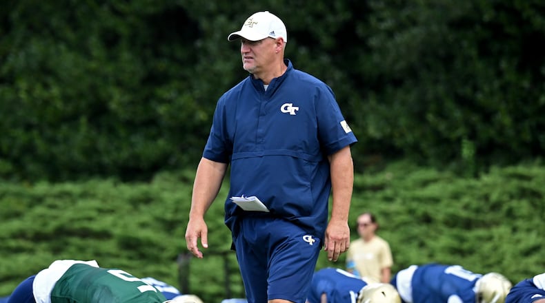 Chris Weinke, Quarterbacks/Co-Offensive Coordinator, watches during a training camp at Georgia Tech’s Rose Bowl Field, Tuesday, August 1, 2023, in Atlanta. (Hyosub Shin / Hyosub.Shin@ajc.com)