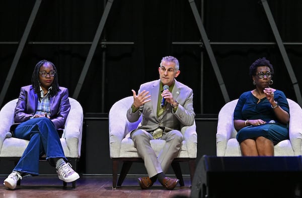 DeKalb County interim Superintendent Norman C. Sauce III (center) speaks during a panel discussion with other school administrators at a community meeting on possible DeKalb school closures at New Life Church on Tuesday, April 28, 2026, in Decatur. (Hyosub Shin/AJC)