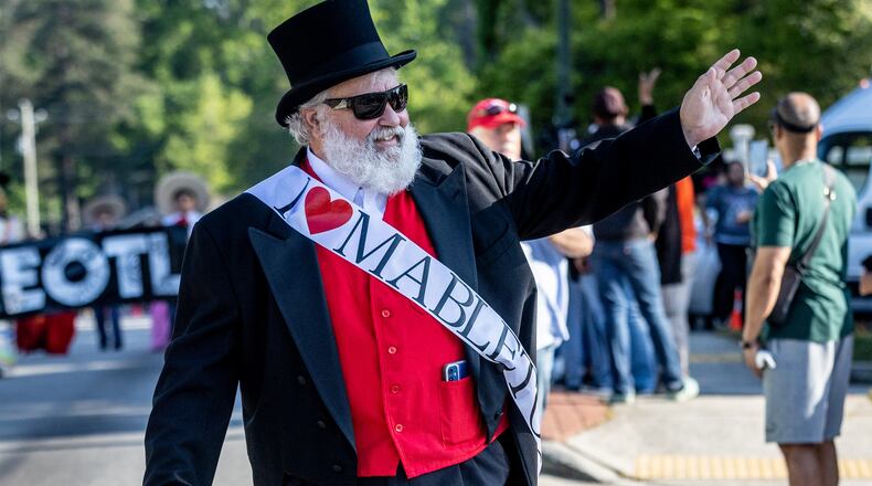 Jeff Padgett waves to the crowd during the second Taste Of Mableton Festival parade Saturday, April 15, 2023. (Steve Schaefer/steve.schaefer@ajc.com)