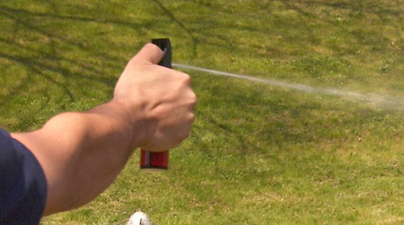 A man and his 2-year-old daughter were pepper sprayed in Seattle’s Green Lake Park after the father confronted a man who was taking photos of sunbathing women without their knowledge.