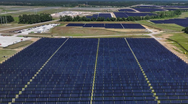An aerial image shows a large construction site where Silicon Ranch is building one of Georgia’s largest solar farms in one of the state’s smallest counties, on Tuesday, April 21, 2026. A trio of proposals could bring large solar arrays to south Georgia. (Miguel Martinez/AJC)