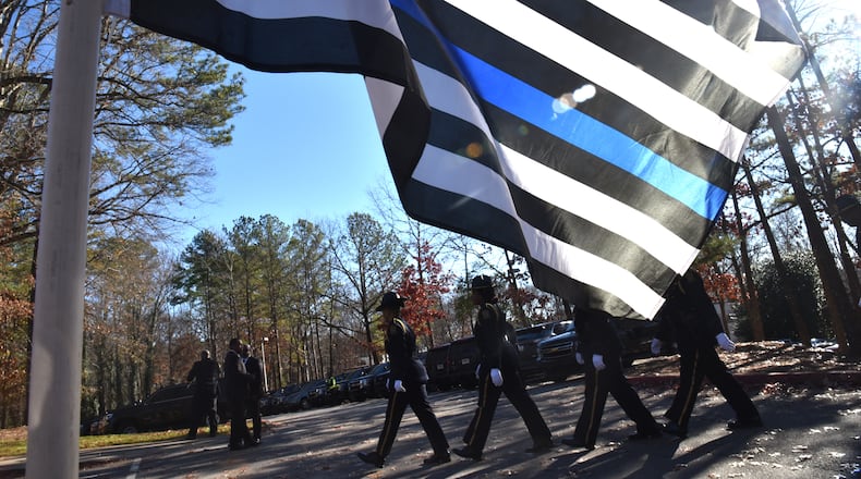 Hundreds of police officers from around Georgia attend the funeral service of officer Edgar Isidro Flores at All Saints Catholic Church in Dunwoody on Tuesday, December 18, 2018. Flores was shot and killed in DeKalb County in the line of duty.