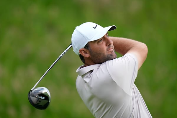 Scottie Scheffler tees off on the seventh hole during a practice round ahead of the U.S. Open golf tournament at Oakmont Country Club Tuesday, June 10, 2025, in Oakmont, Pa. (AP Photo/Seth Wenig)