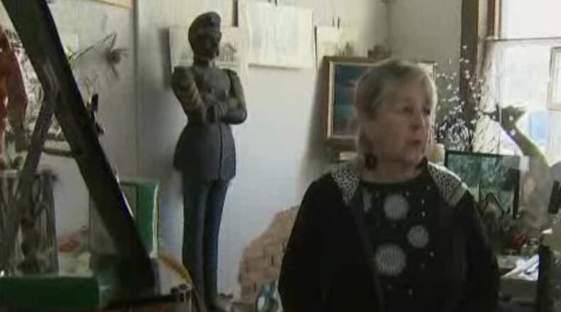 Janet Upchurch talks about theft at her antiques and gift shop in Hall County.