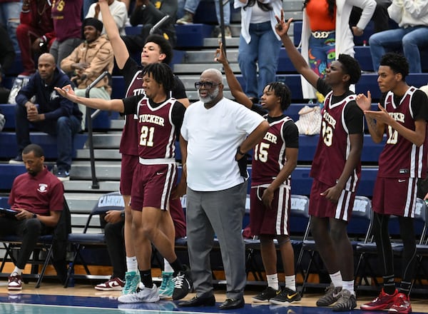 Coach James Hartry (center) and Tucker fell 58-56 to Cambridge on Saturday, Feb. 28, 2026, in the final game of Hartry's 26-year run as coach of the Tigers. (Hyosub Shin/AJC)