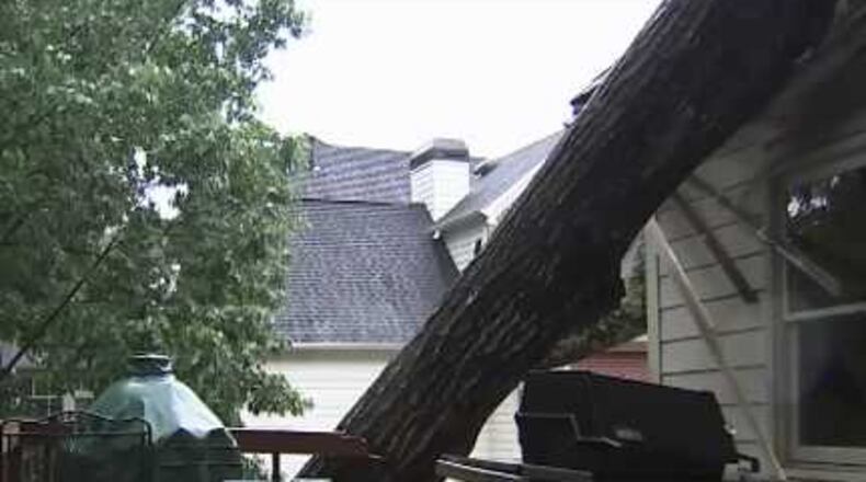 A tree crashed into Alpharetta Councilman Dan Merkel’s home Saturday.