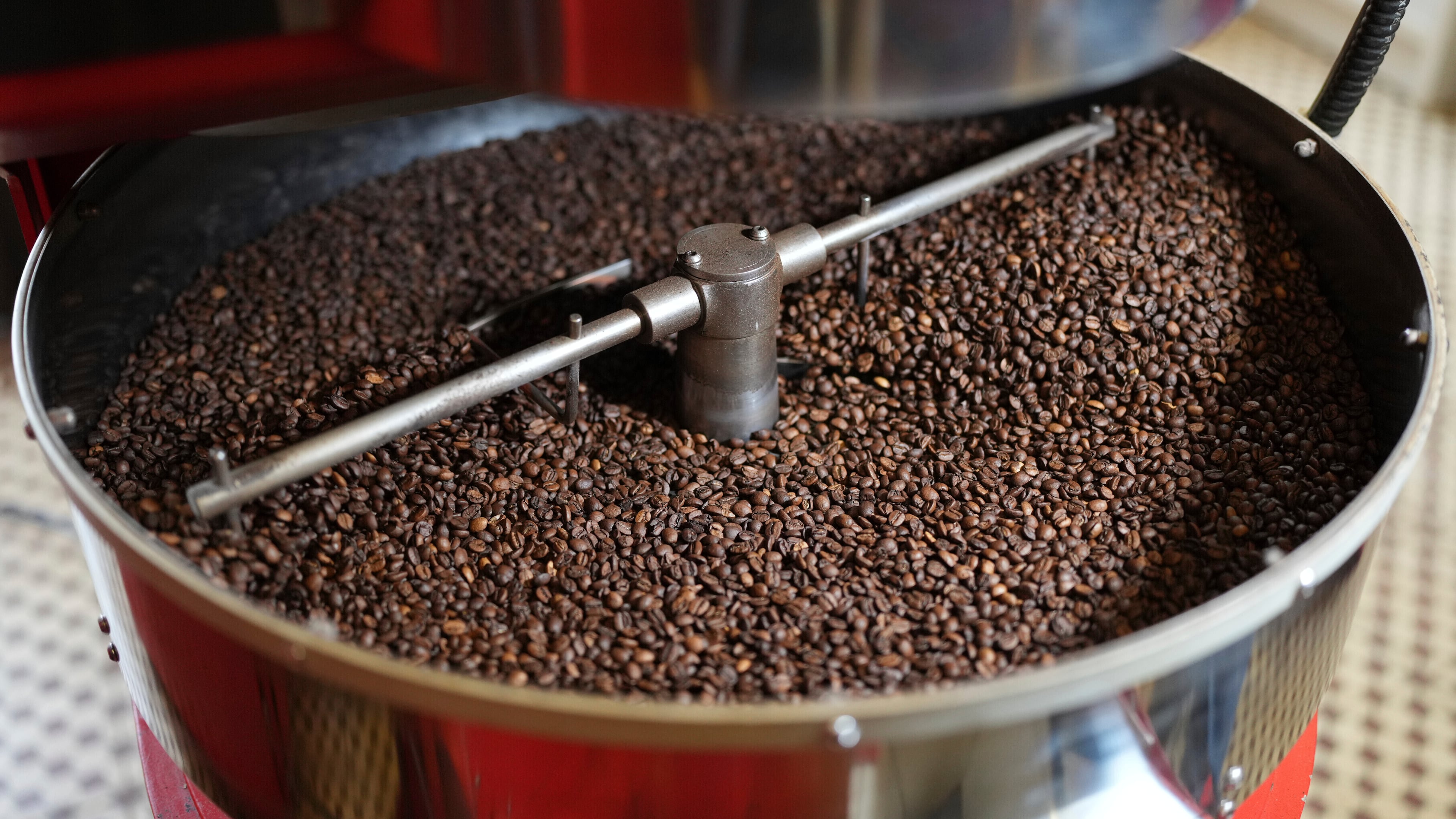 FILE - Coffee beans are prepared at a farm in Braganca Paulista, Brazil, Monday, Aug. 4, 2025. (AP Photo/Andre Penner, File)
