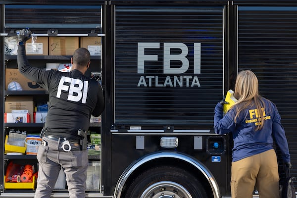 FBI agents conduct a raid of the Fulton County Election Hub and Operation Center in Union City on Wednesday, Jan. 28, 2026. (Arvin Temkar/AJC)