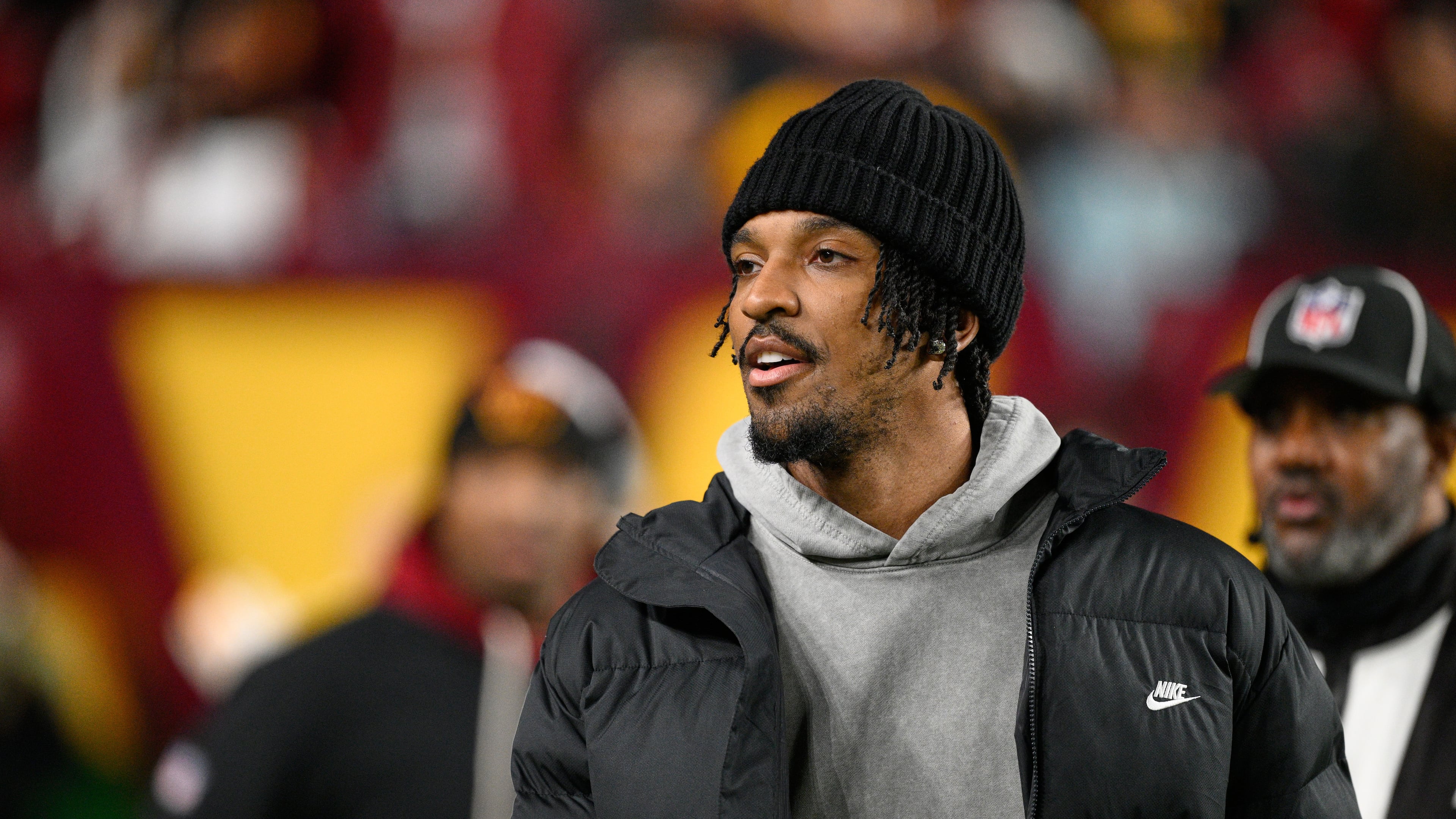 Washington Commanders quarterback Jayden Daniels is seen on the sidelines before an NFL football game against the Denver Broncos Sunday, Nov. 30, 2025, in Landover, Md. (AP Photo/Nick Wass)