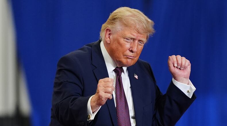 President Donald Trump dances on stage at a Mack Trucks facility, Tuesday, June 23, 2026, in Macungie, Pa. (AP Photo/Julia Demaree Nikhinson)