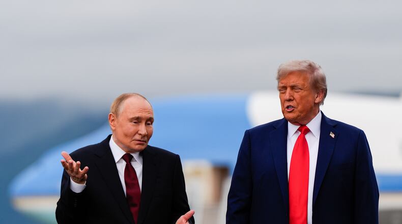 FILE - President Donald Trump and Russia's President Vladimir Putin talk, Aug. 15, 2025, at Joint Base Elmendorf-Richardson, Alaska. (AP Photo/Julia Demaree Nikhinson, File)