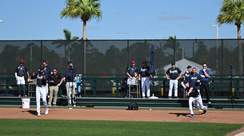 Braves pitchers Ian Anderson (left) and Max Fried work out during spring training at CoolToday Park in North Port, Florida. (Hyosub Shin / Hyosub.Shin@ajc.com)