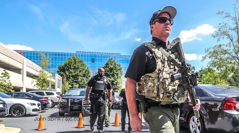 The Fiserv building in Alpharetta was evacuated Tuesday after someone reported an armed person.