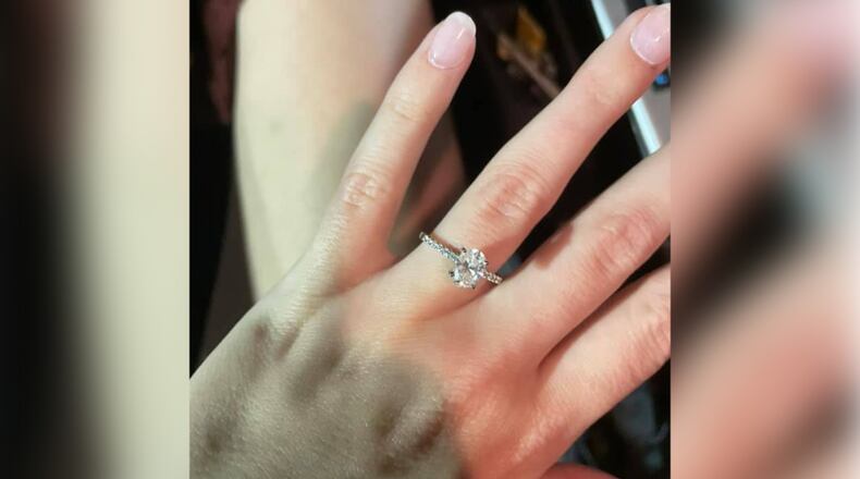 A Georgia couple getting engaged on the beach in Tybee Island over the weekend lost the engagement ring in the sand seconds after the man popped the big question. But, as luck would have it, the missing ring was quickly recovered after the pair turned to social media for help.