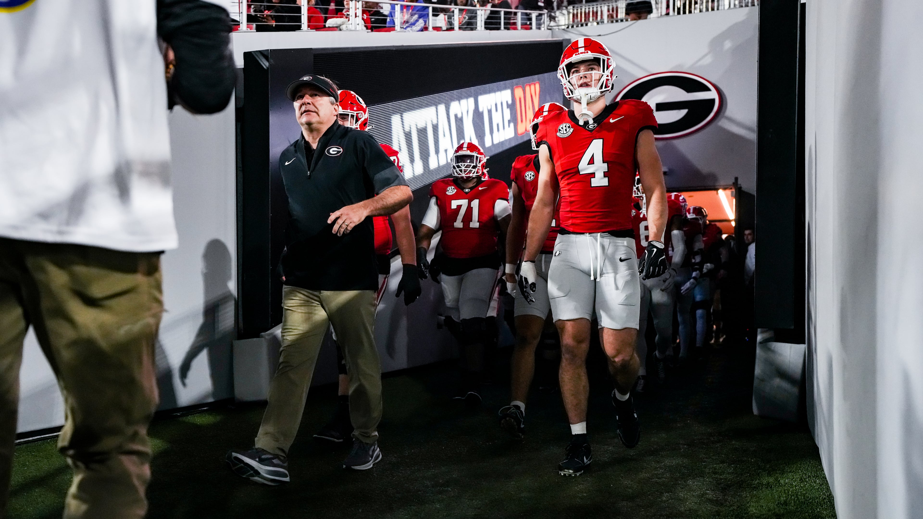 Georgia tight end Oscar Delp, leaving the tunnel with coach Kirby Smart, played his final regular-season home game at Sanford Stadium on Saturday. (Tony Walsh/UGAAA)