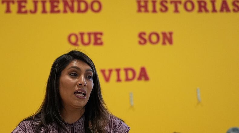 Muxe artist Xaneri Merino gives a backstrap loom workshop for LGBTQ+ people in Mexico City, Tuesday, April 14, 2026. (AP Photo/Marco Ugarte)