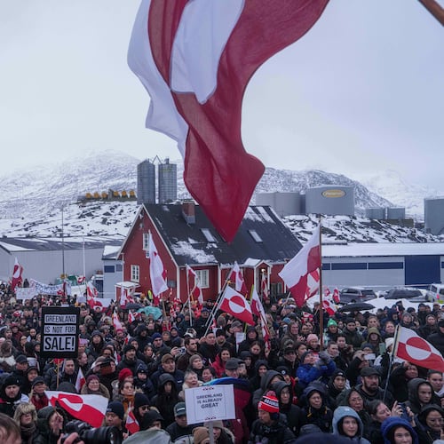 FILE - People protest against Trump's policy towards Greenland in front of the US consulate in Nuuk, Greenland, Jan. 17, 2026. (AP Photo/Evgeniy Maloletka, File)