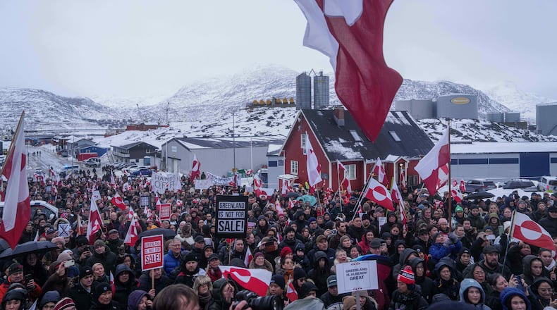 FILE - People protest against Trump's policy towards Greenland in front of the US consulate in Nuuk, Greenland, Jan. 17, 2026. (AP Photo/Evgeniy Maloletka, File)