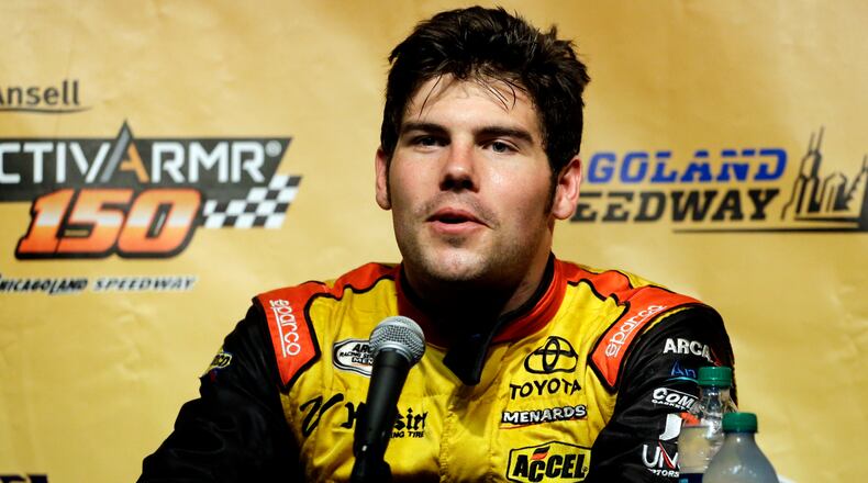 John Wes Townley, shown during a 2014 news conference, was killed Saturday in a shooting in Athens that also injured his ex-wife. According to police, Townley attacked the gunman with a hatchet before he opened fire.