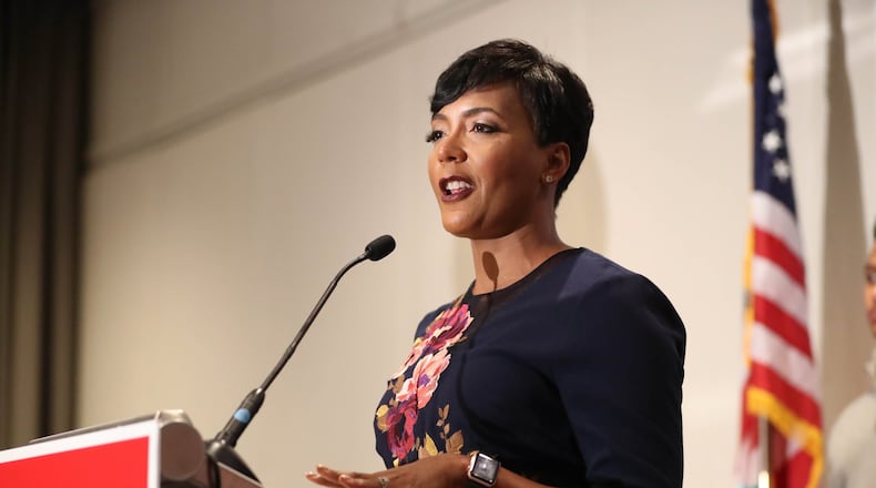 Atlanta mayoral candidate Keisha Lance Bottoms speaks to supporters during her election watch party at the Hyatt Regency Atlanta on Nov. 7. PHOTO / JASON GETZ