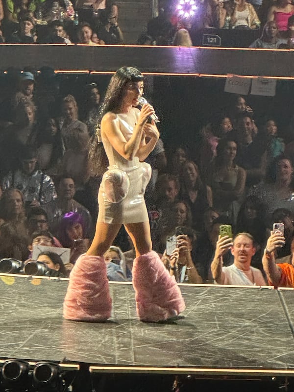 Katy Perry wore cotton candy boots with actual cotton candy on them during her "Lifetimes" stop at State Farm Arena on Wednesday, Aug. 20, 2025. (Rodney Ho/AJC)