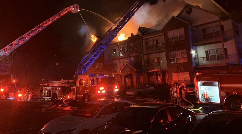 Tuesday's blaze in McDonough destroyed one building and displaced 32 residents, fire officials said.