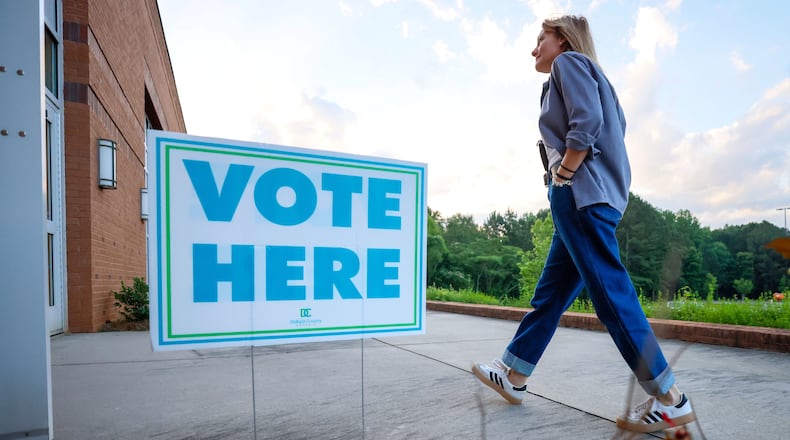 A person walks into the Beuhla Community Family Life Center in Dekalb County to vote in the May 21 primary elections.
(Miguel Martinez/The Atlanta Journal-Constitution)