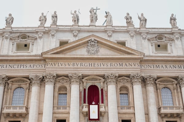 Pope Leo XIV appears at the central balcony of St. Peter's Basilica for his first Sunday blessing after his election, in St. Peter's Square at the Vatican, Sunday, May 11, 2025.(AP Photo/Gregorio Borgia)