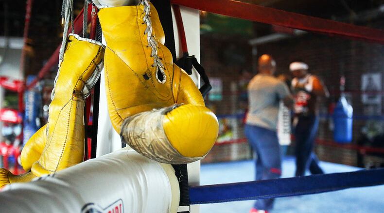 Xavier Biggs, who coached his brother Tyrell to a gold medal in the 1984 Olympics in Los Angeles, owns the Decatur Boxing Club.