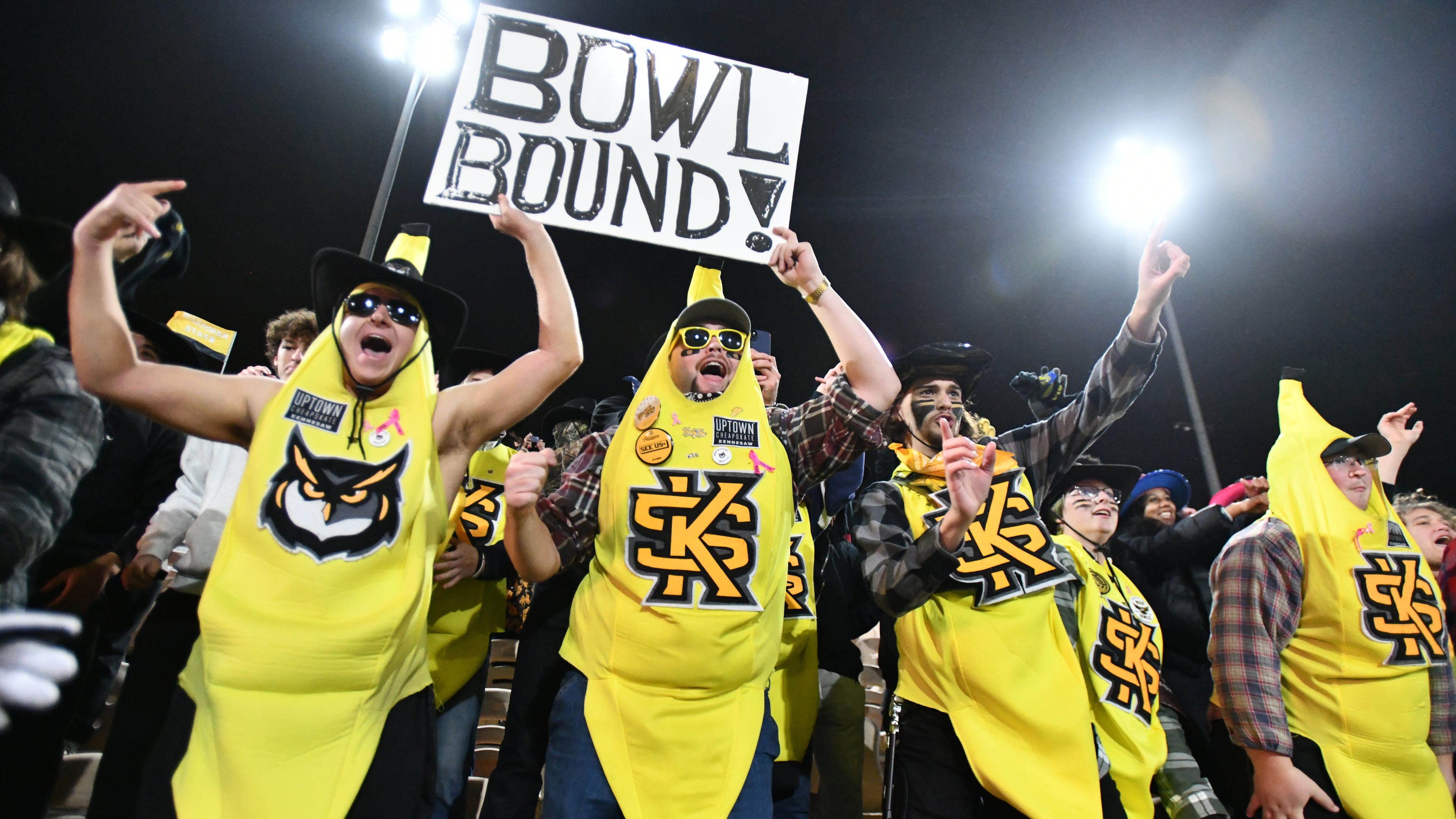 Kennesaw State fans celebrate after Kennesaw State beat UTEP during an NCAA college football game at Fifth Third Stadium, Tuesday, Oct. 28, 2025, in Kennesaw. Kennesaw State won 33-20 over the University of Texas at El Paso. (Hyosub Shin/AJC)